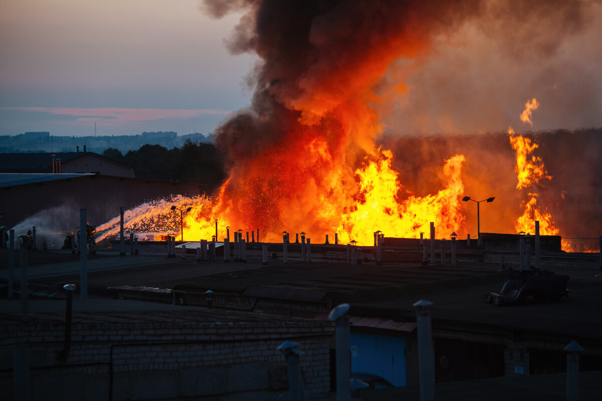 Large blaze at burning industrial building