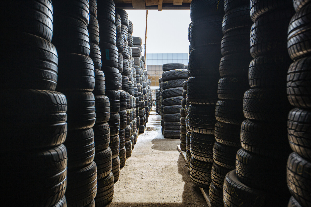 Stack of tires for sale in warehouse