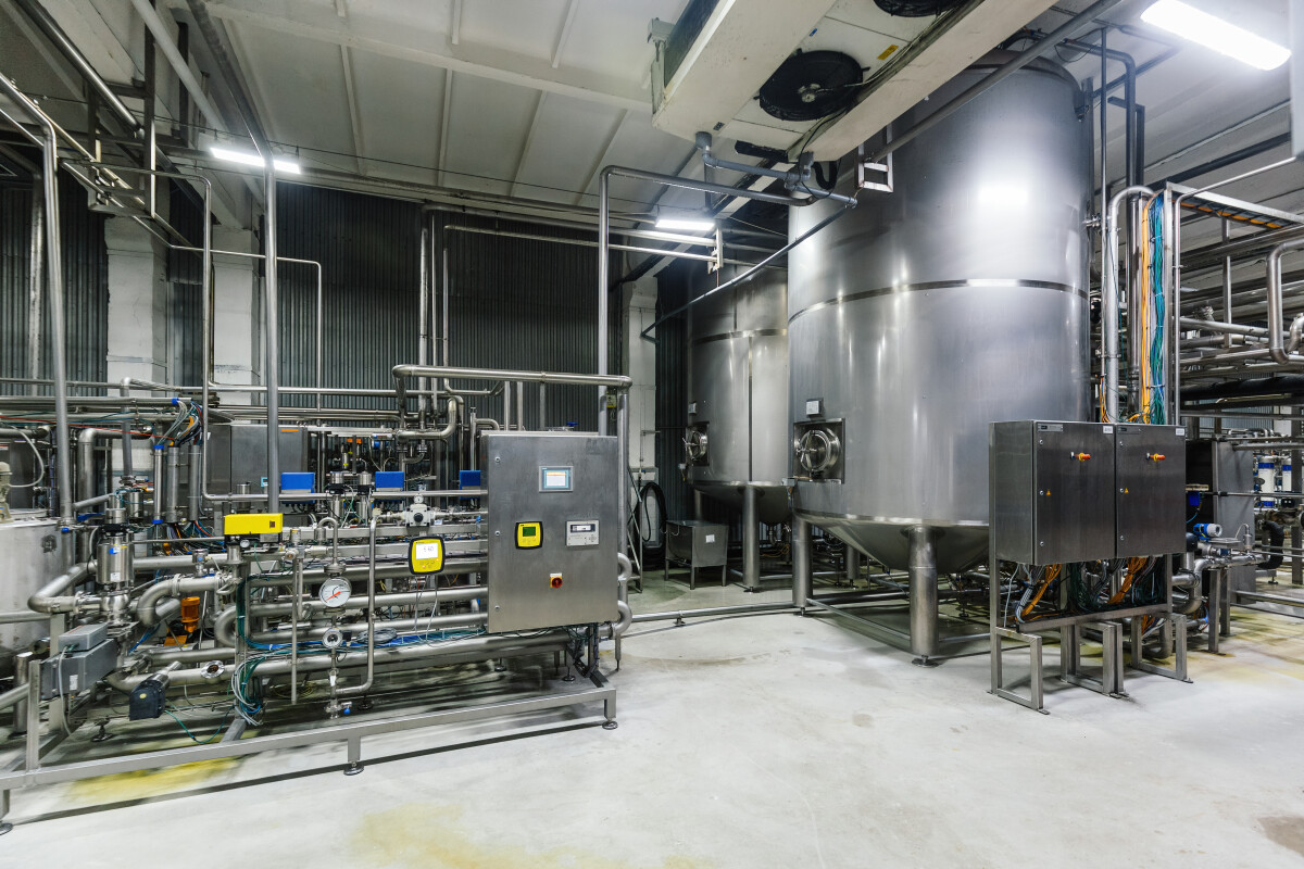 Modern brewery production line. Filtration equipment and pump machinery