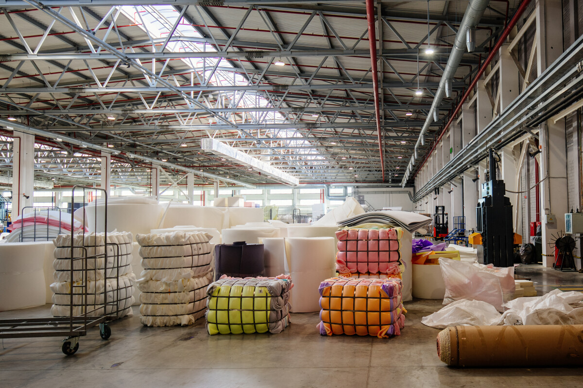 Packs of foam rubber in warehouse