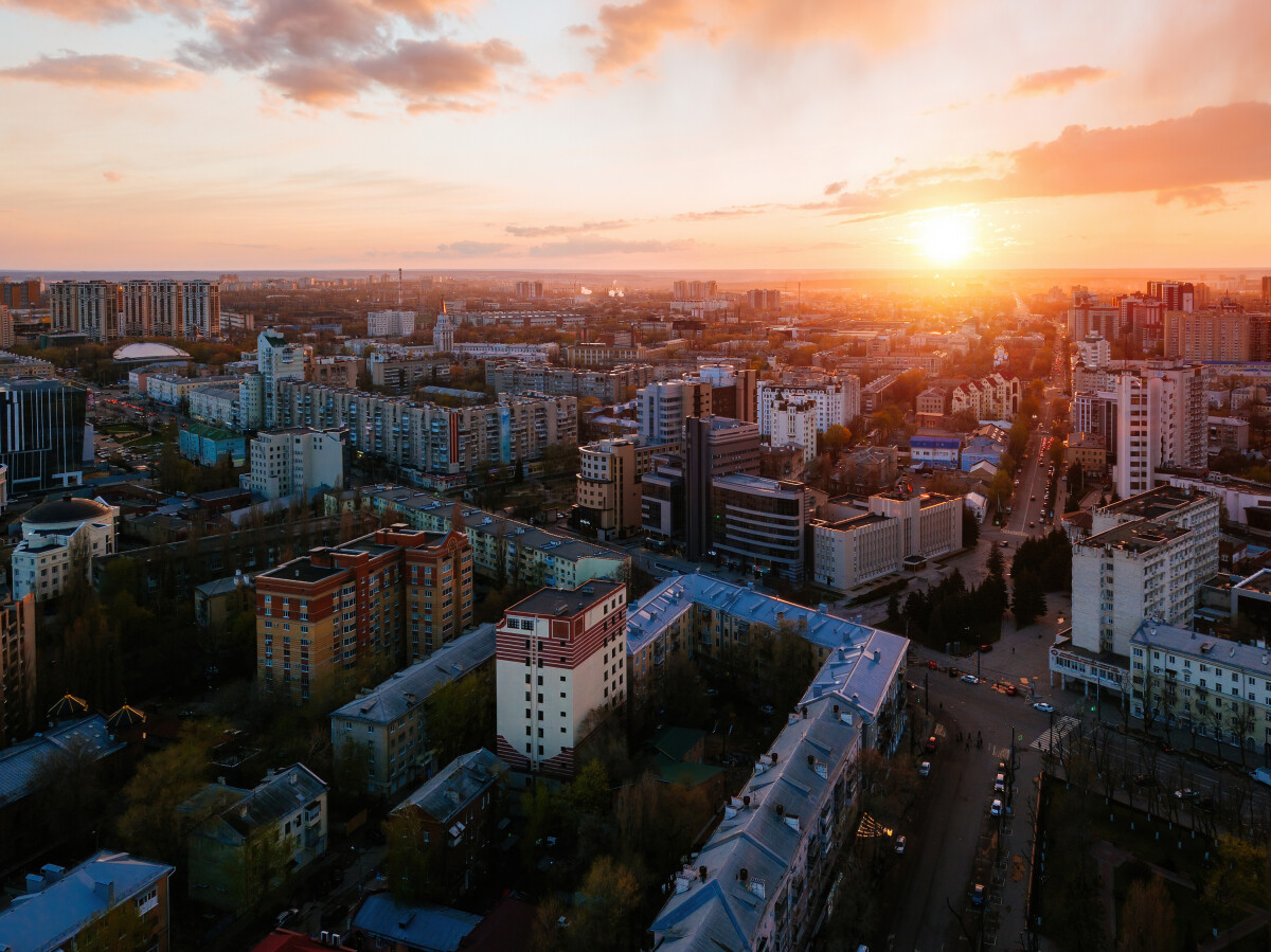 Evening spring Voronezh cityscape at sunset, aerial view