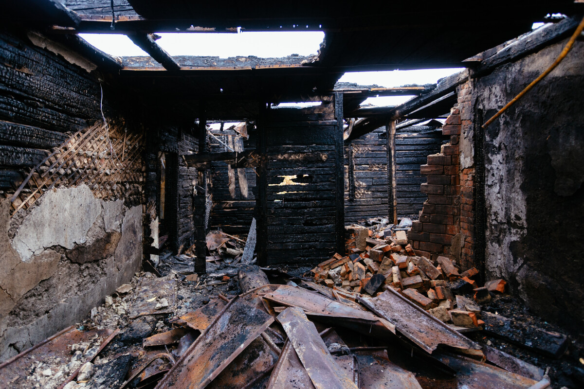 Aftermath of fire. Completely burnt house interior