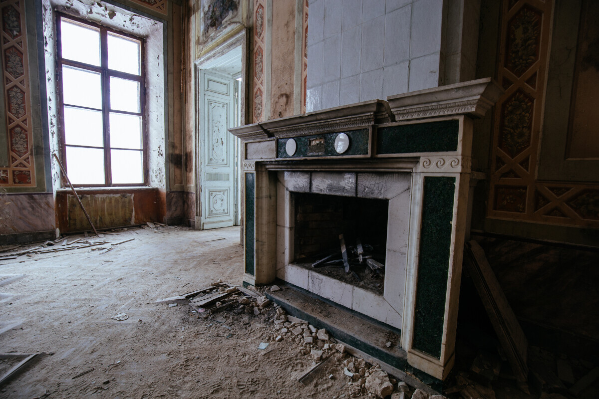 Old fireplace in abandoned mansion Pertovo-Dalnee, Moscow region