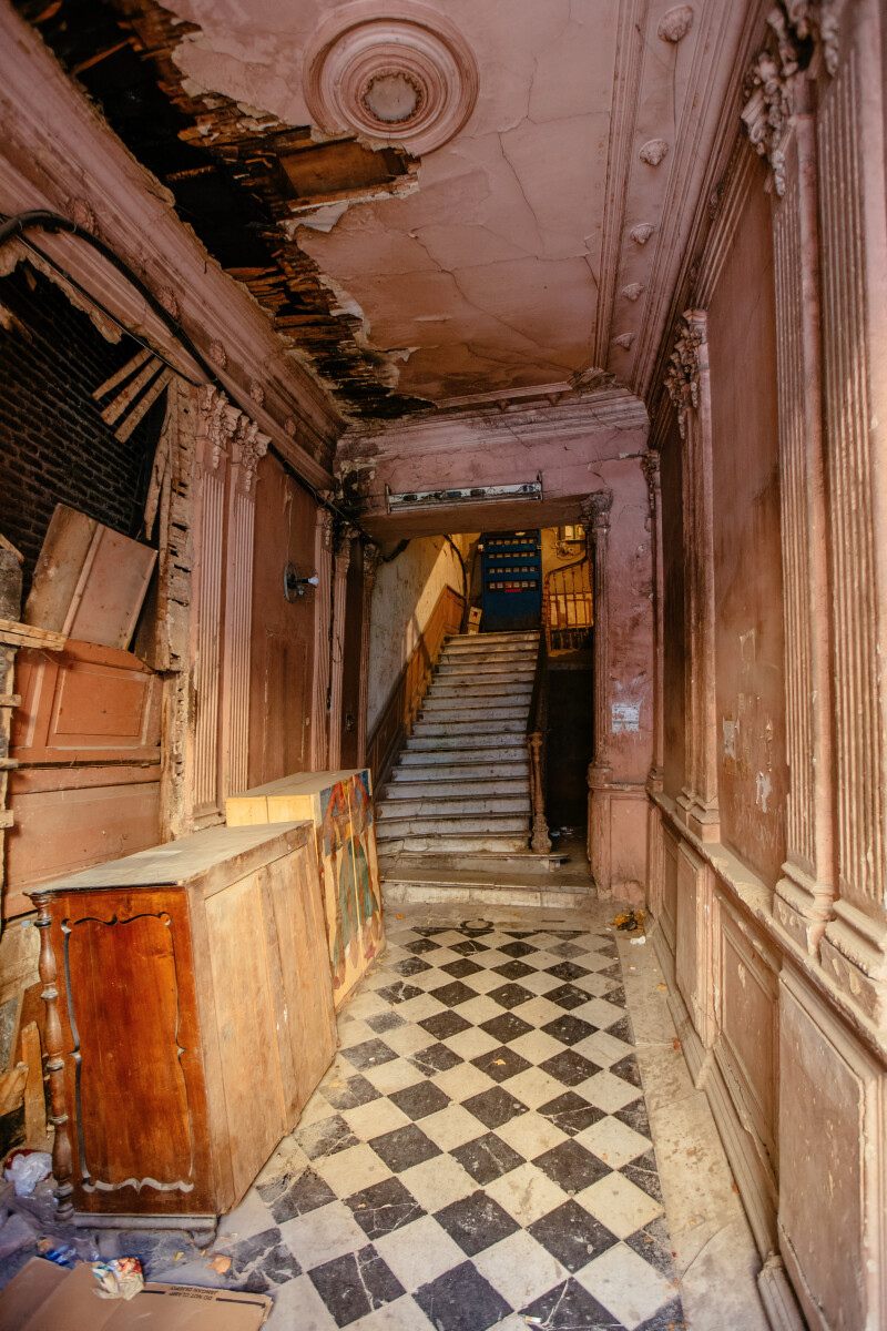 Entrance hall in old abandoned mansion