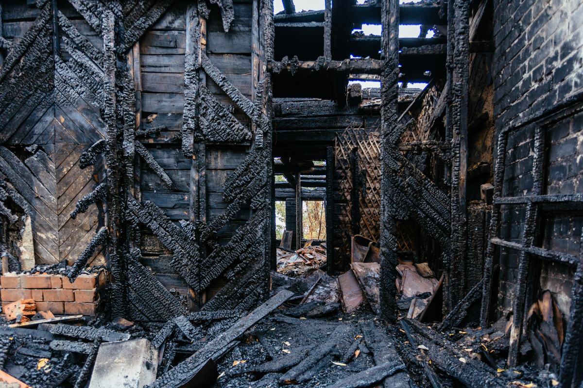 Aftermath of fire. Completely burnt house interior