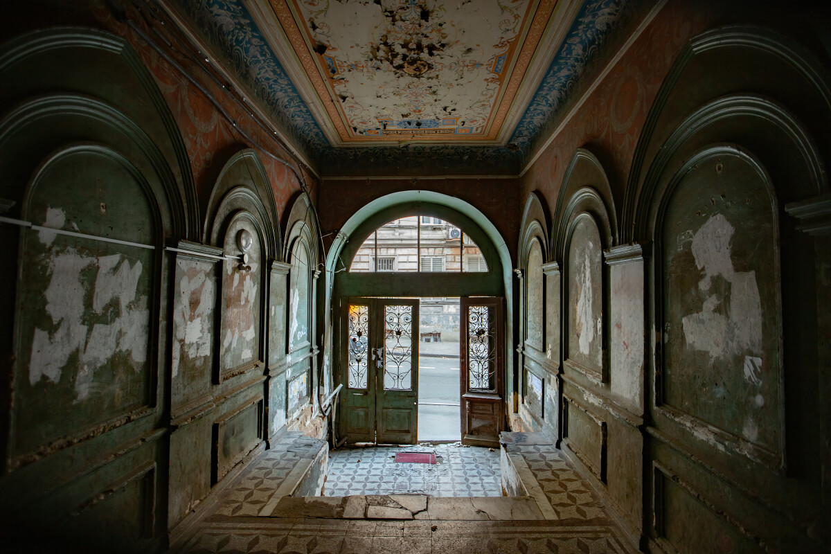 Entrance hall in old abandoned mansion