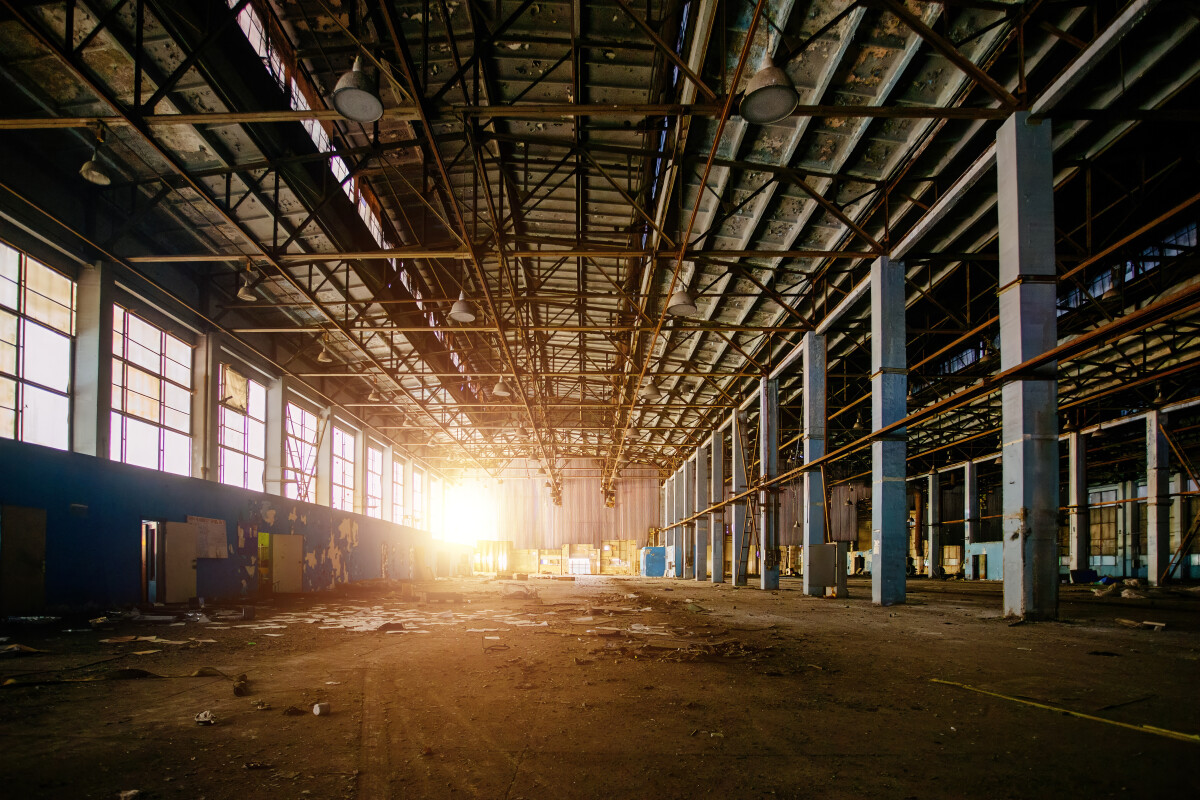 Old broken empty abandoned industrial building interior