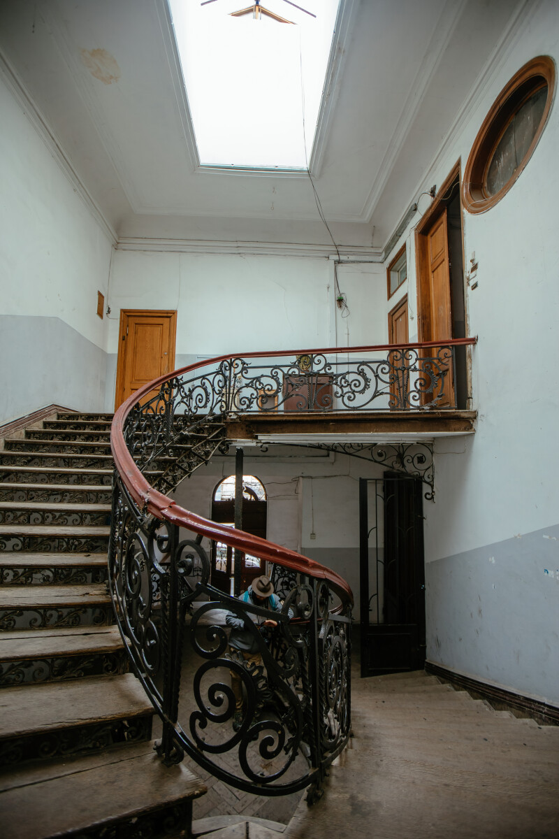 Vintage forged cast iron spiral staircase at the old mansion