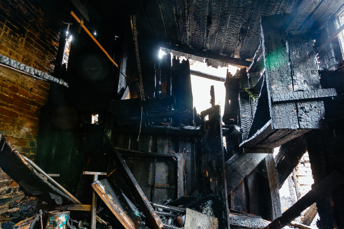 Aftermath of fire. Completely burnt house interior