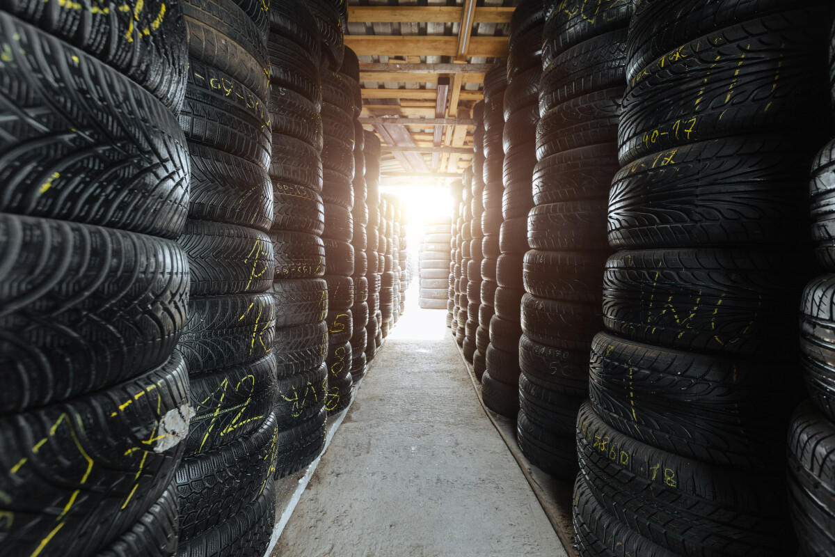 Stack of tires for sale in warehouse