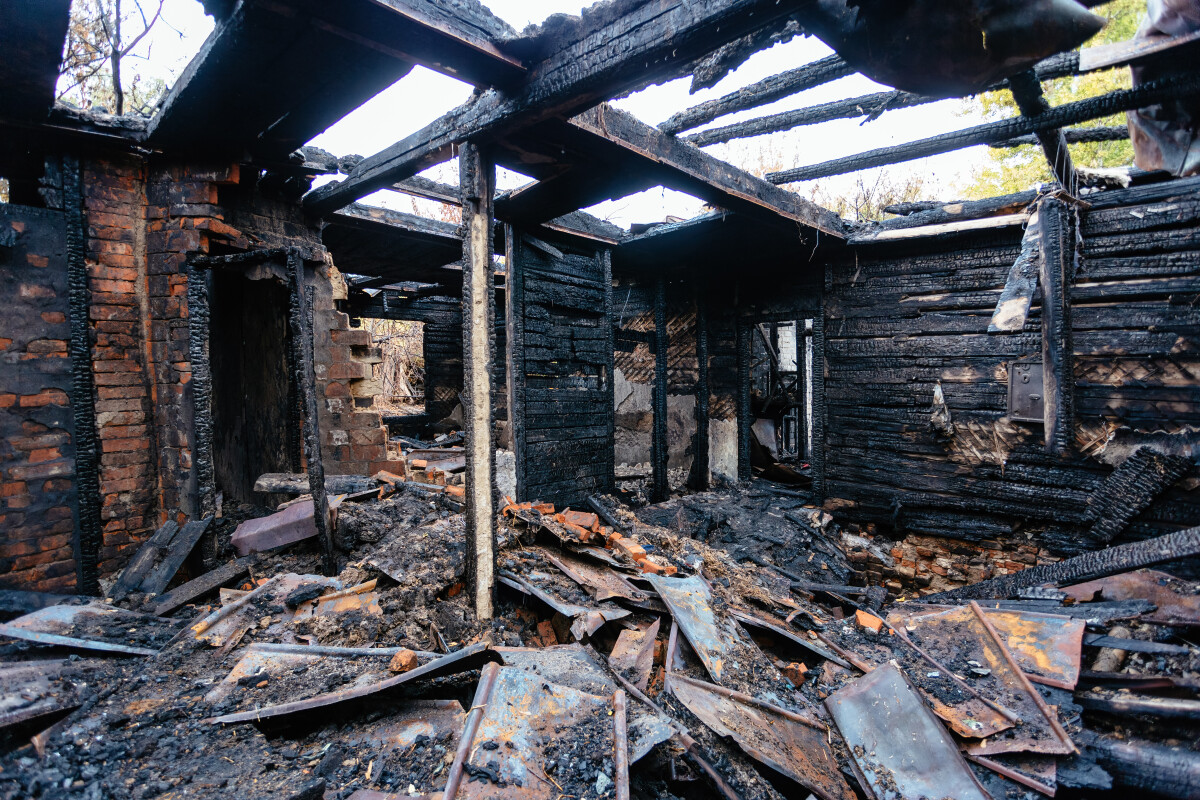 Aftermath of fire. Completely burnt house interior