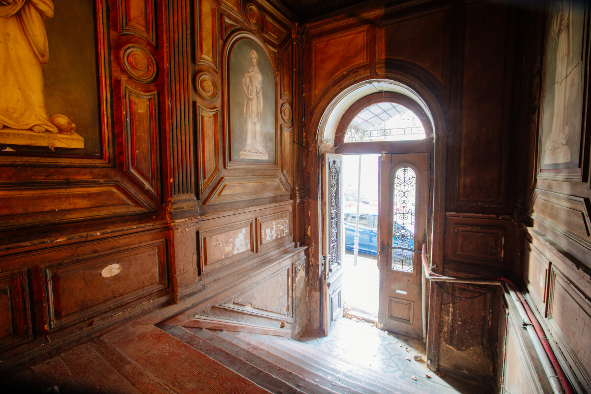 Entrance hall in old abandoned mansion