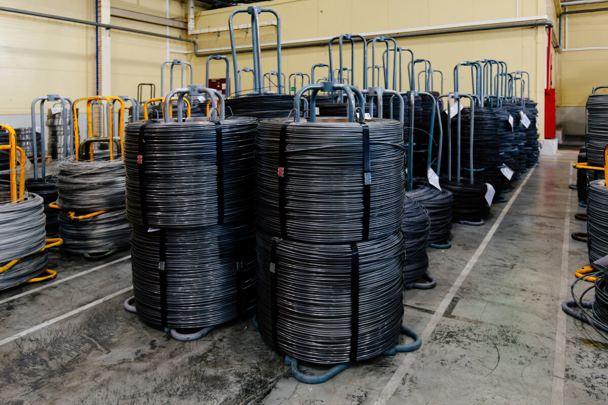 Steel wire coils in metalworking factory