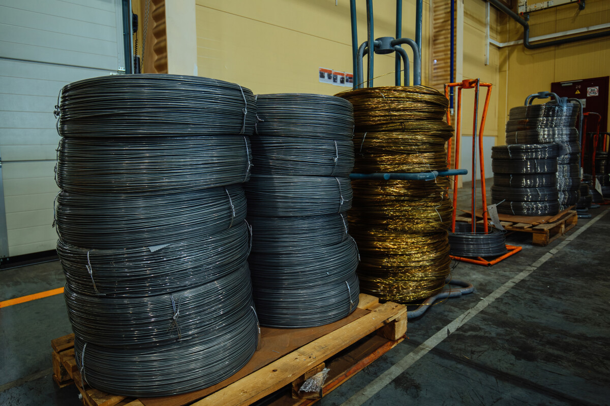 Steel wire coils in metalworking factory