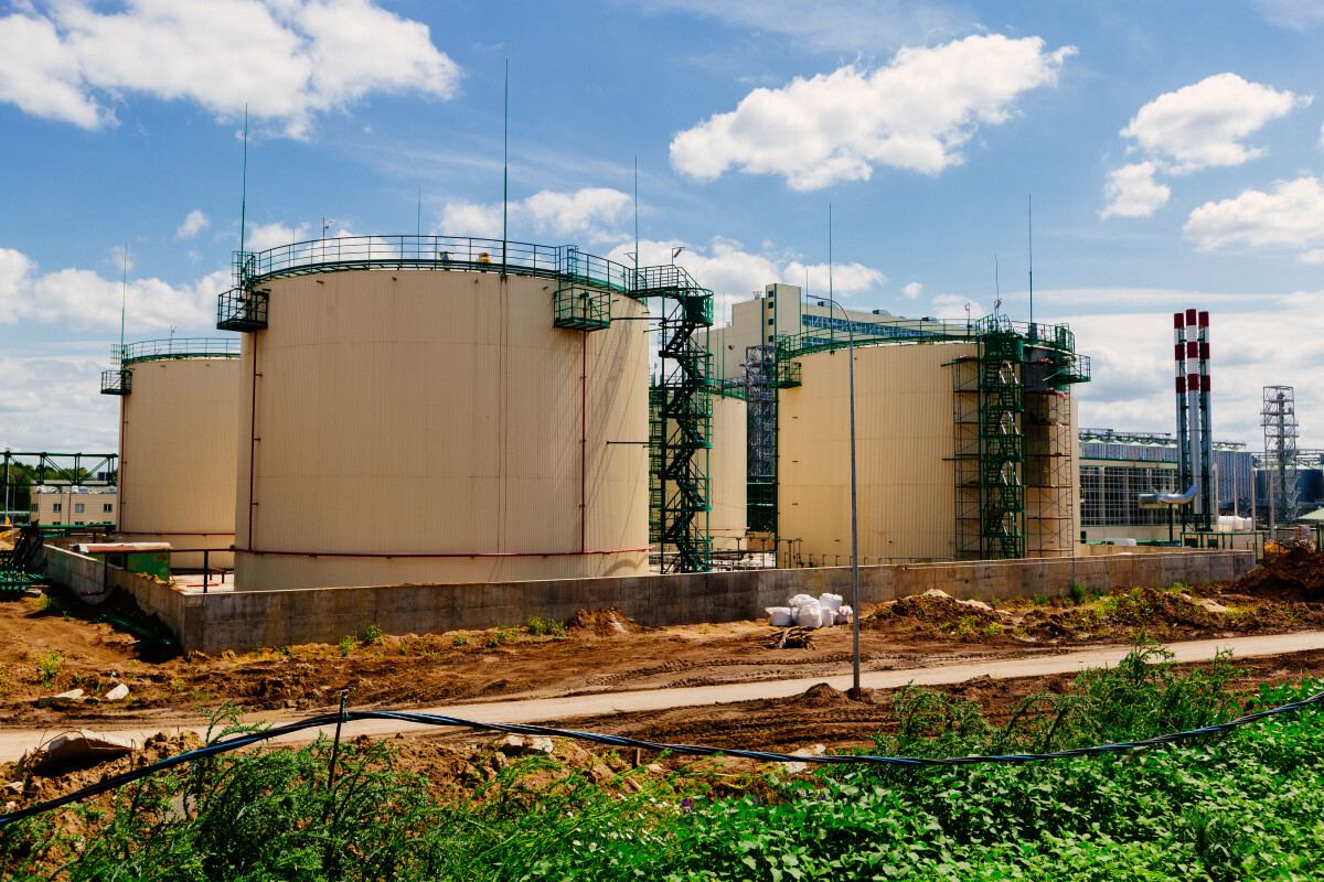 Large industrial round tanks for chemical production or oil. Construction of chemical factory