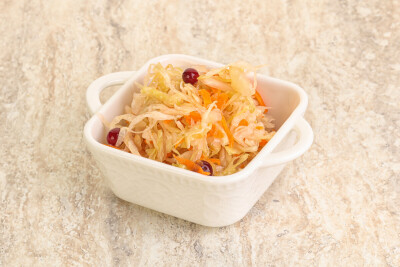 Fermented cabbage with carrot - sauerkraut in the bowl